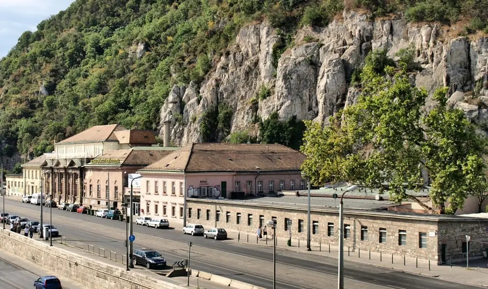 Rudas Bath complex along the riverside road at the foot of Gellért Hill cliffs