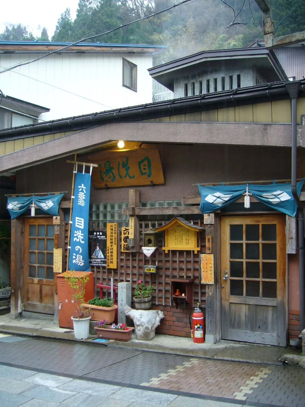 Mearai no Yu public bathhouse on a stone street in Shibu Onsen