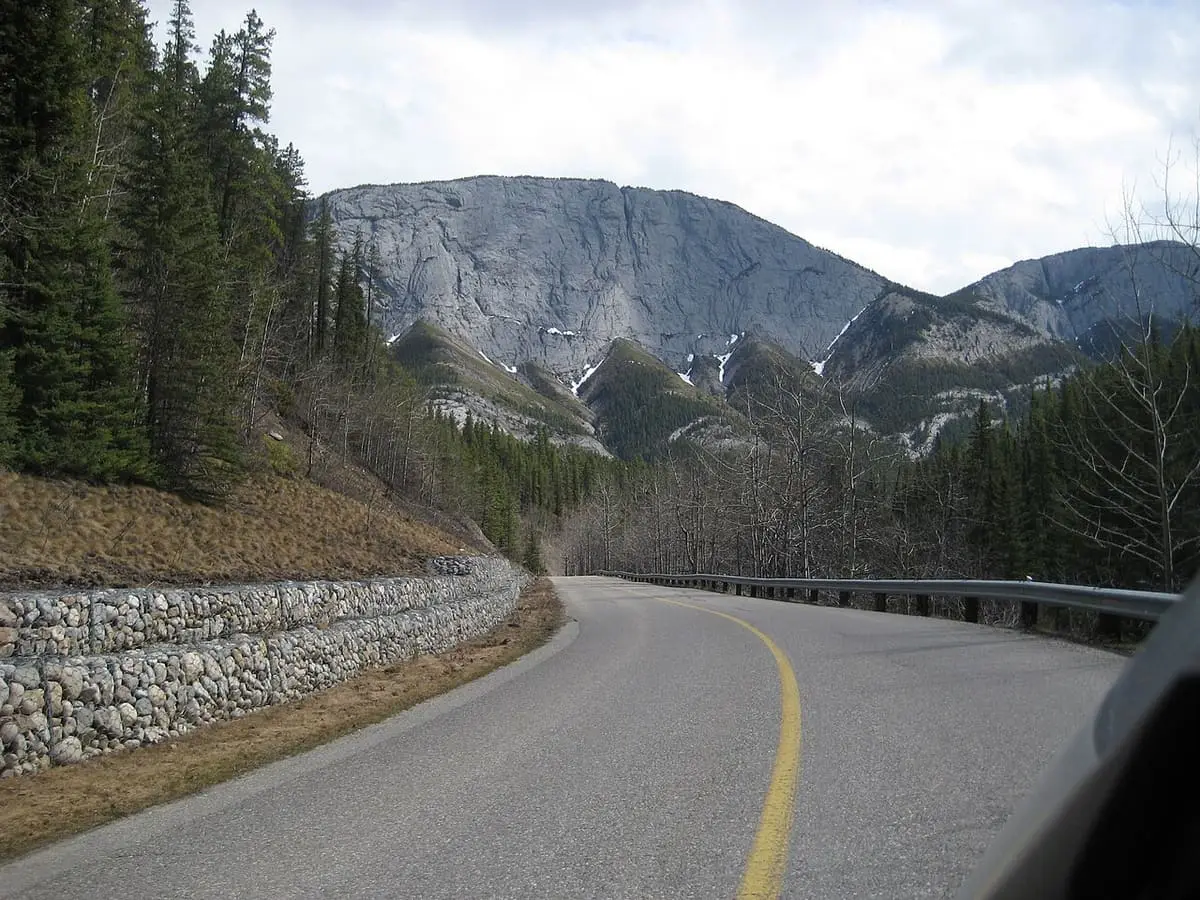 Road to Miette Hot Springs curving below the cliffs of Ashlar Ridge