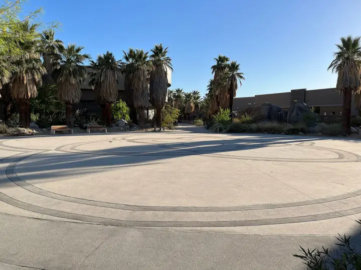 Palm lined Agua Caliente Cultural Plaza in downtown Palm Springs, home of The Spa at Séc-he