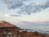 Rocky tide pools of hot spring water on the Sea of Cortez shore at Puertecitos