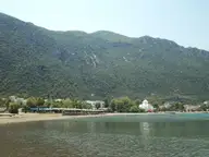 Kamena Vourla bay with the town below steep green mountains