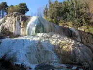 Massive white travertine formation known as the Balena Bianca at Bagni San Filippo