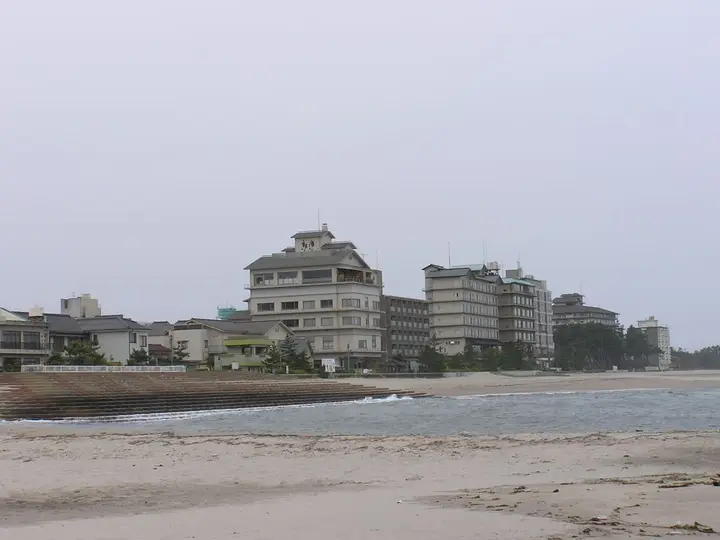 Hotels of Kaike Onsen lining the sandy beach on the Sea of Japan