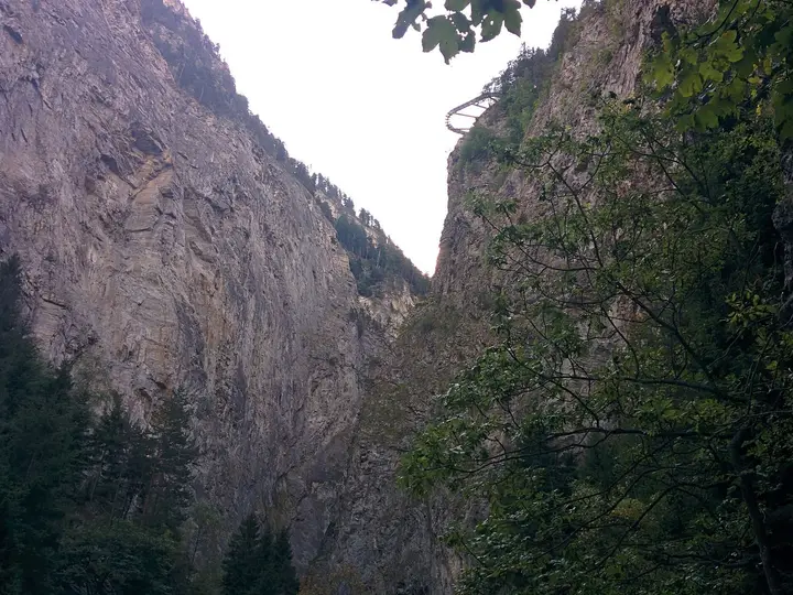 Steep rock walls of the Orrido gorge above the Pré Saint Didier thermal baths
