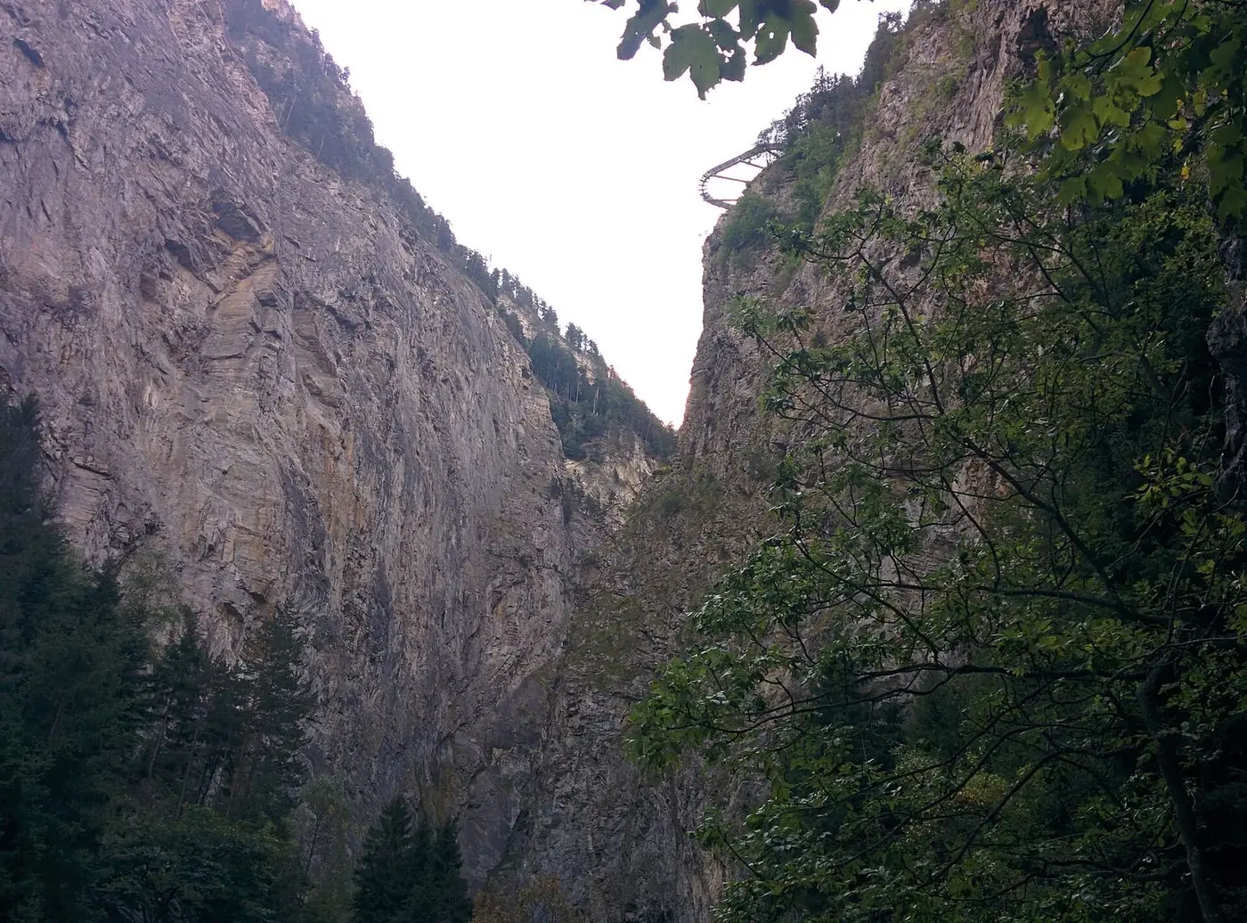 Steep rock walls of the Orrido gorge above the Pré Saint Didier thermal baths